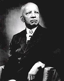 220px-Carter_Woodson.jpg (9754 bytes)